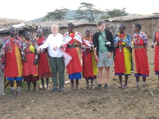 Alice and Lizzy with Masai warriors in Kenya